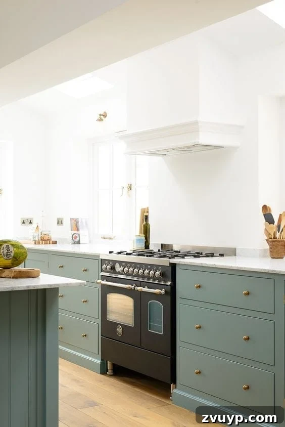 Fresh Green Kitchen Cabinet Ideas 8 DeVOL Trinity Blue paint on kitchen cabinets, a unique blue-green hue creating a tranquil yet characterful kitchen.