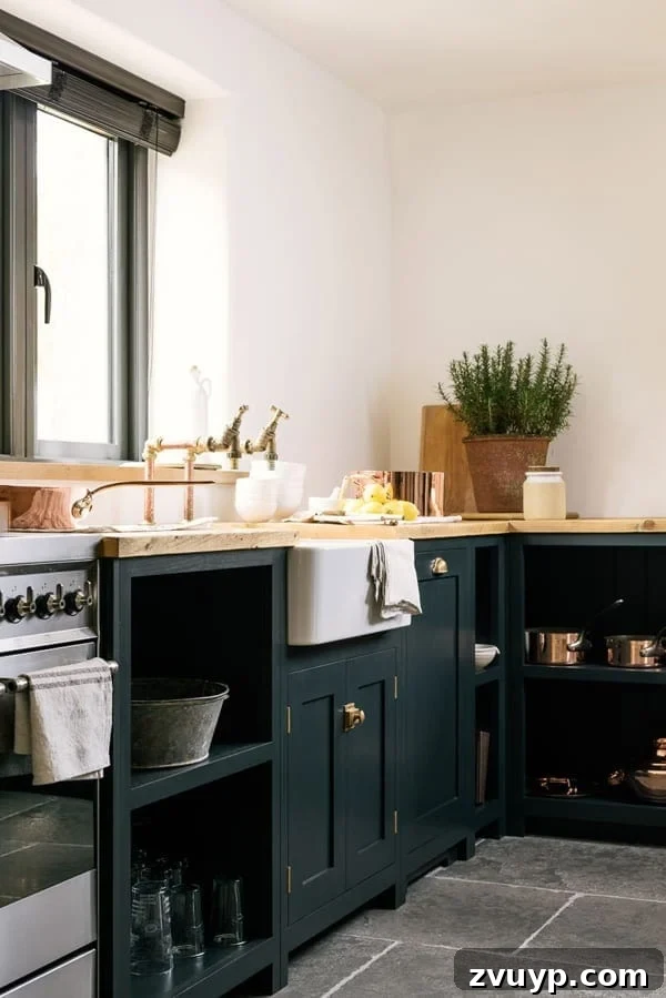 Fresh Green Kitchen Cabinet Ideas 10 DeVOL Pantry Blue paint on kitchen cabinets, a subdued blue-green that brings a classic, quaint charm to the space.