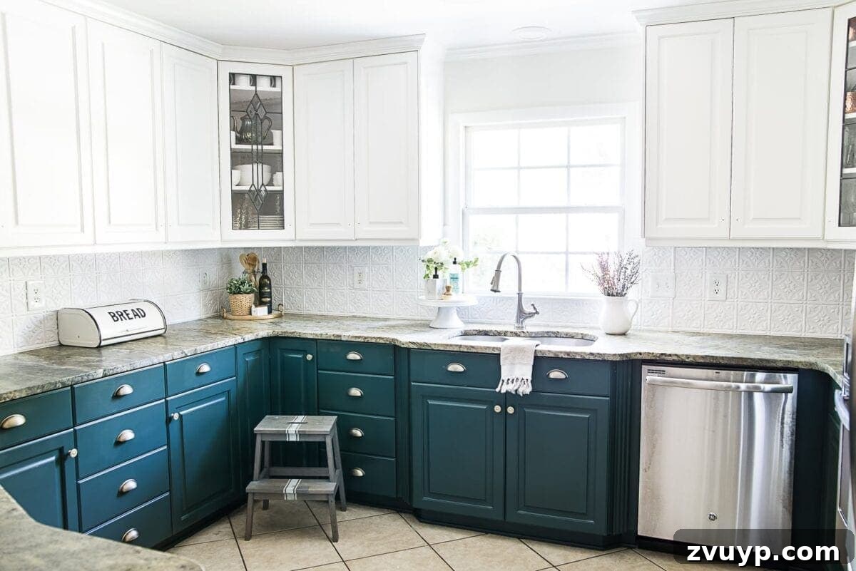 Vibrant Green Kitchen Cabinet Makeover 8 Kitchen featuring Benjamin Moore Simply White upper and Sherwin Williams Billiard Green lower cabinets with newly installed aged brass hardware