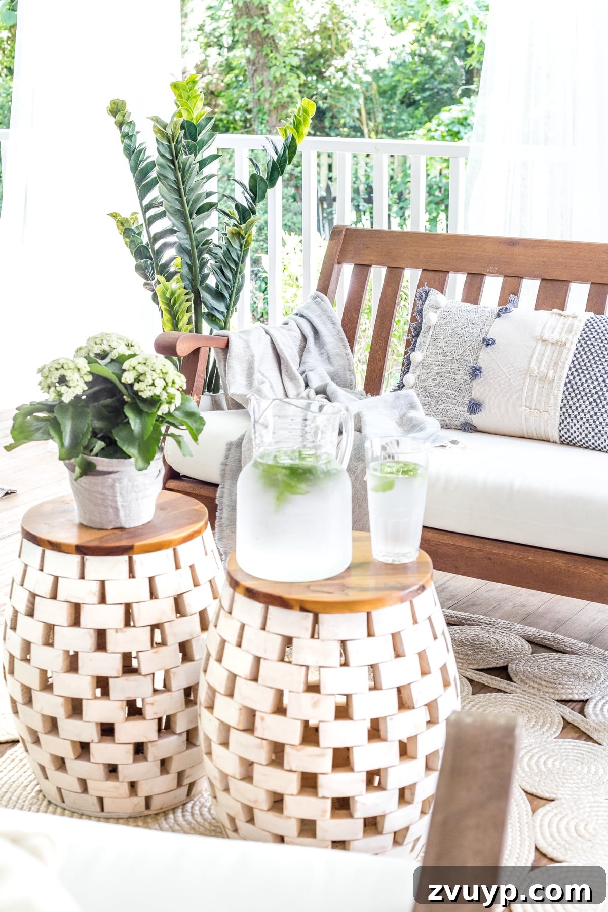 Our Summer Porch Haven 19 Summer decor on back porch with garden stools and an outdoor bench, perfect for morning coffee