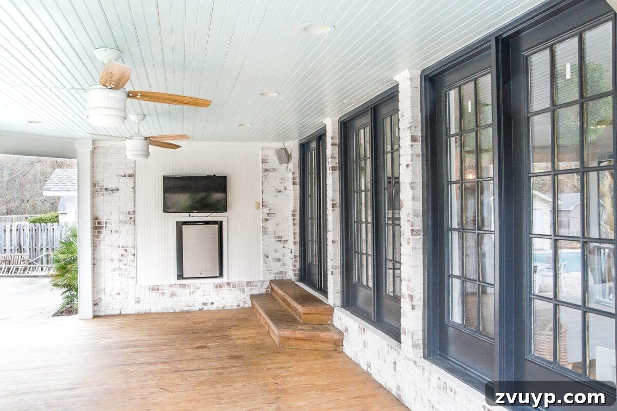 Our Summer Porch Haven 5 Limewashed brick back porch with haint blue ceiling and black doors