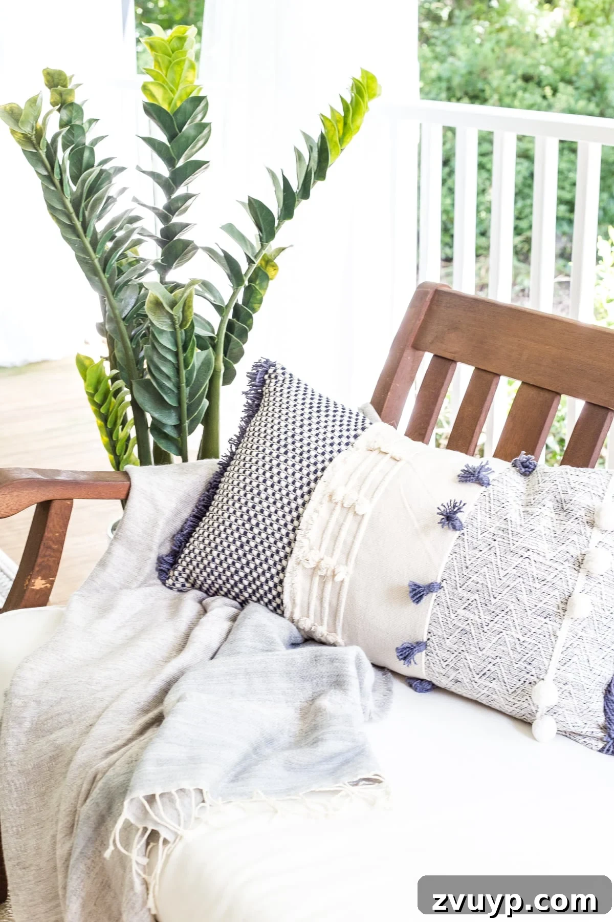 Our Summer Porch Haven 9 Summer outdoor decor on back porch with a throw pillow on a bench