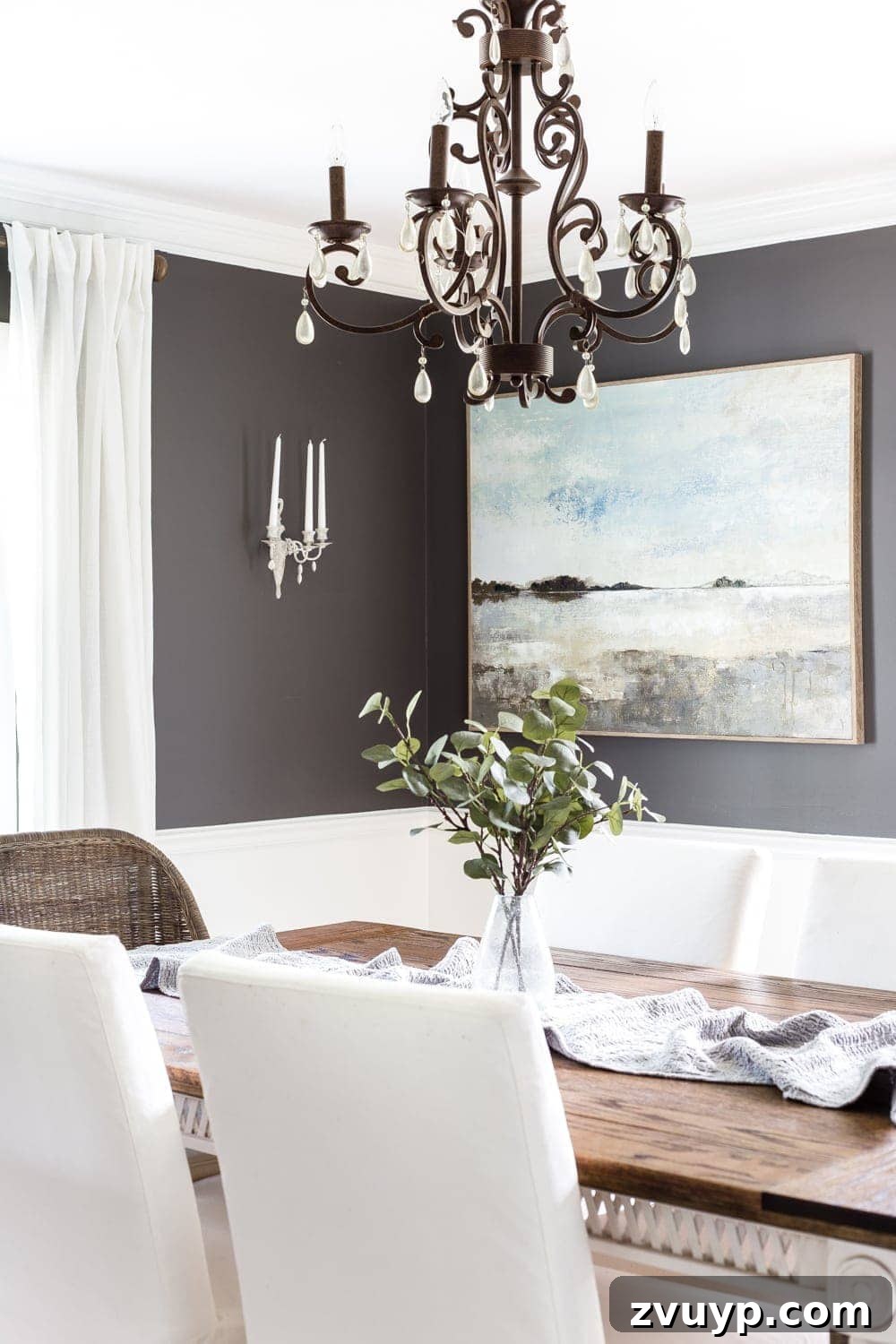 From 80s Brass to French Chic: DIY Sconce 11 Charcoal and white dining room, showcasing the new French sconces