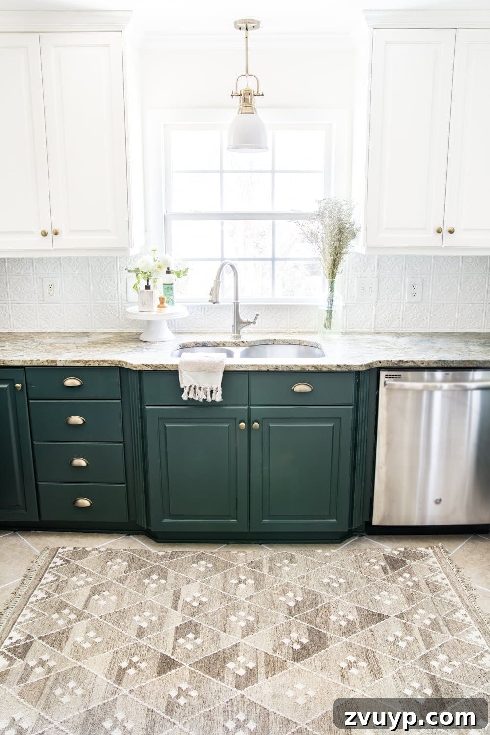 Revitalize Your Kitchen: Plush Comfort, Pristine Grout 9 Beautiful deep green kitchen with refreshed elements and a cozy layered rug, showcasing the completed DIY updates.