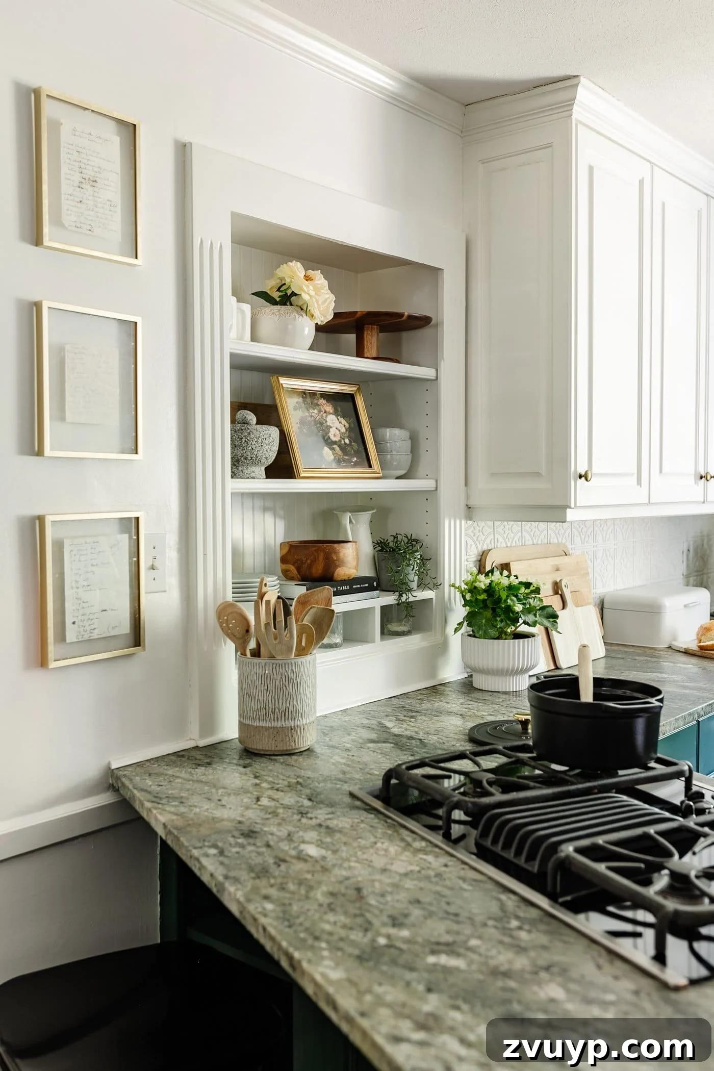 Cozy Cottagecore Kitchen Transformations That Won't Break the Bank 20 Framed handwritten recipe art in elegant float frames, proudly displayed on a kitchen wall, adding a personal and sentimental touch to the decor.