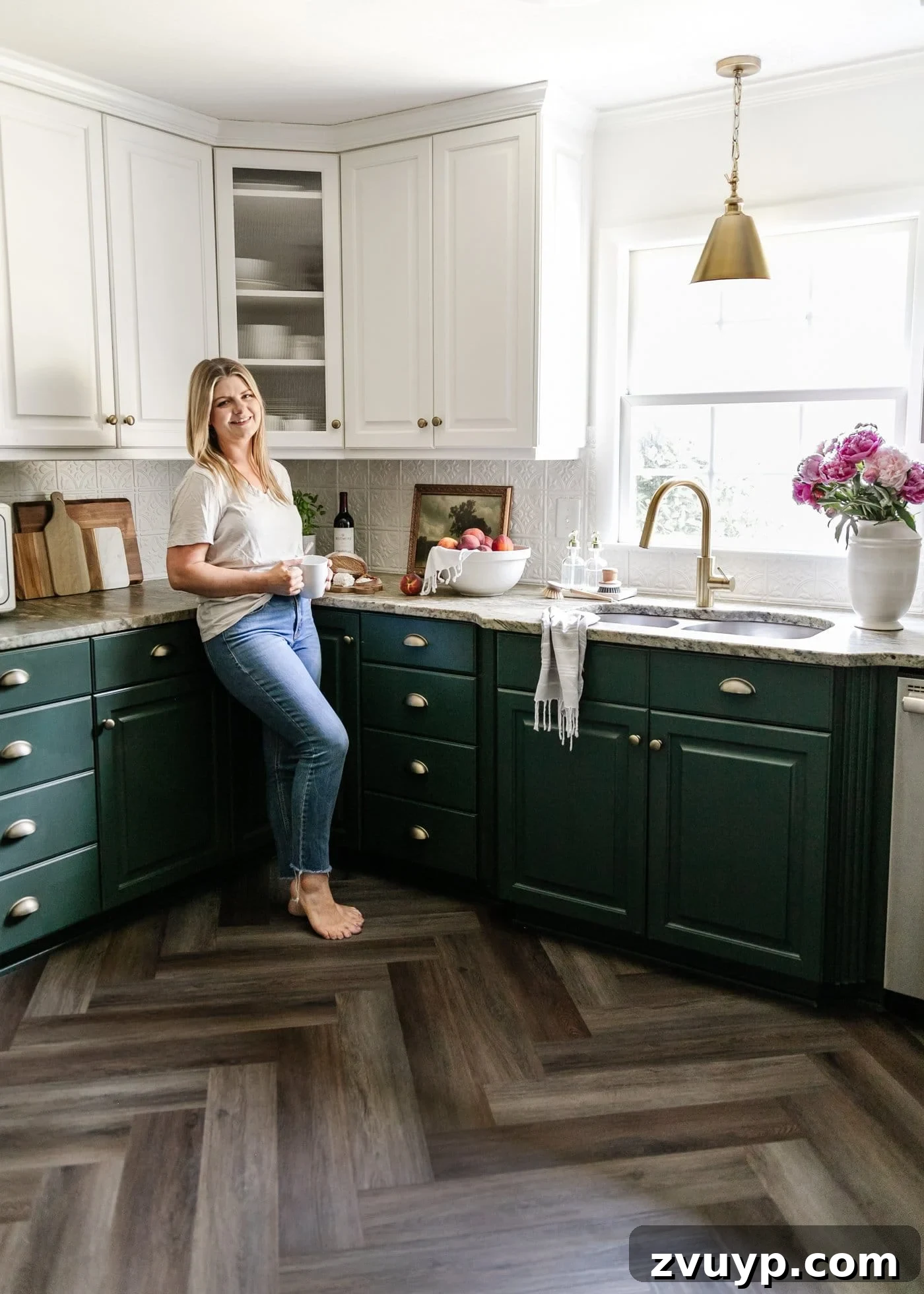 Cozy Cottagecore Kitchen Transformations That Won't Break the Bank 23 The finished kitchen, meticulously styled with various decor elements on the countertops, enhancing its cottagecore charm and inviting atmosphere.