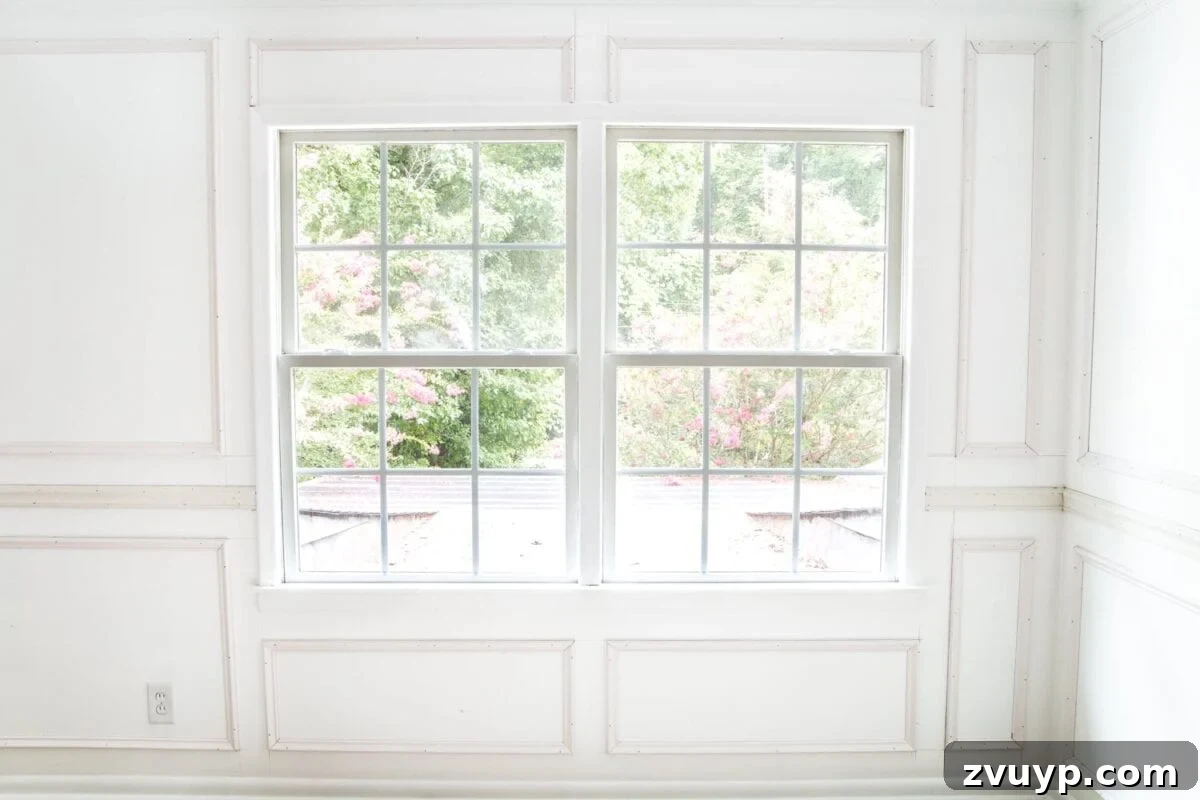Crafting Your Perfect Picture Frames 18 Detailed view of elegant picture frame molding in the newly transformed nursery