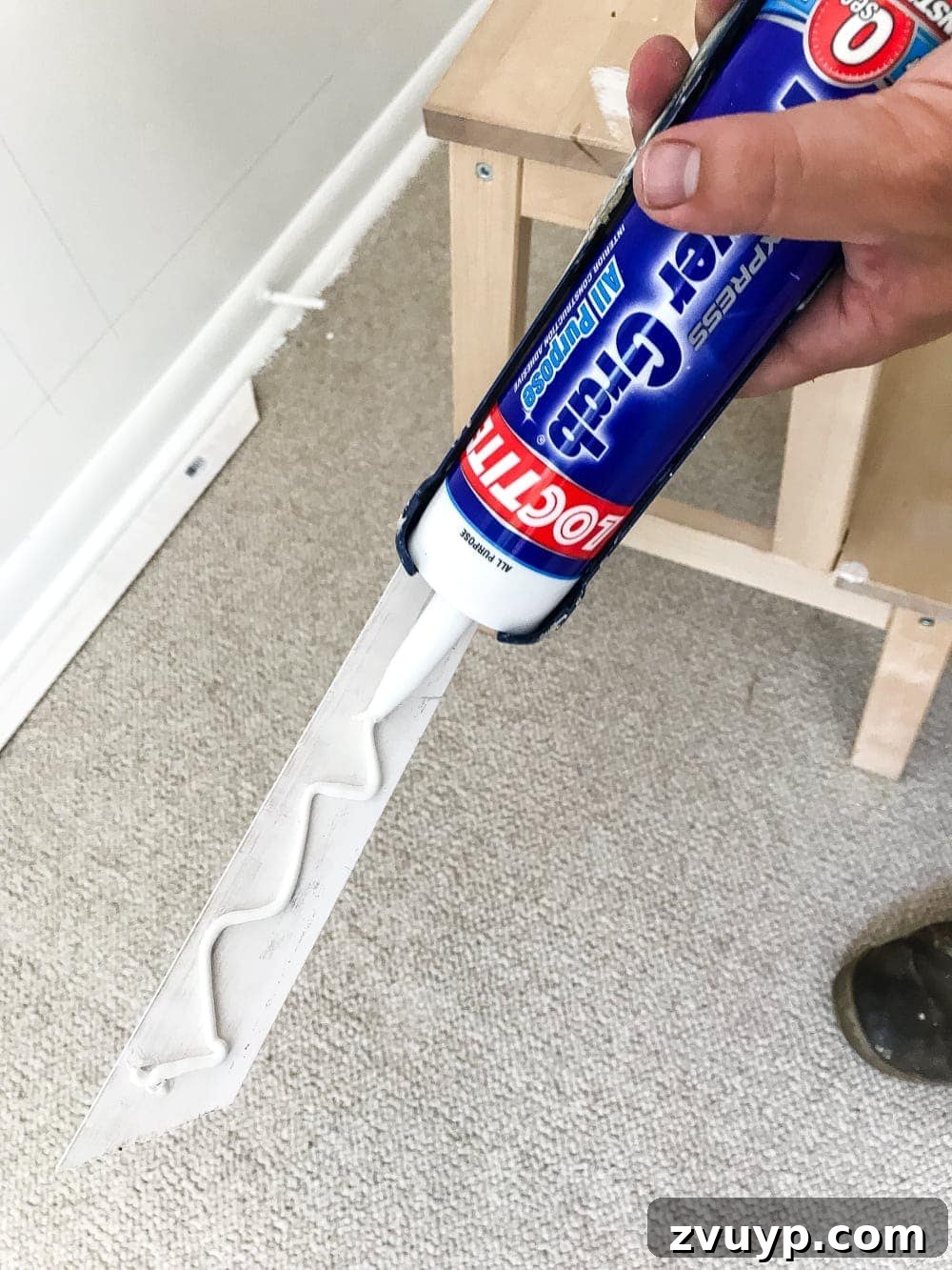 Crafting Your Perfect Picture Frames 10 Applying construction adhesive for secure picture frame molding installation