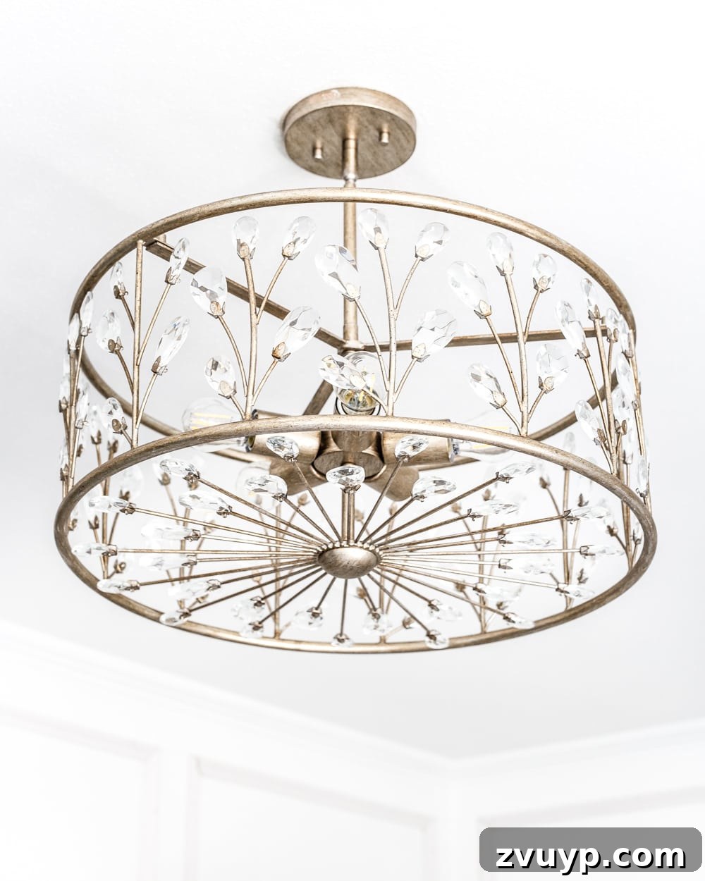 Nursery Lighting Makeover 6 A feminine, vintage, glam lighting update for a baby girl's nursery makeover. #nurserylighting #lightfixture #glamdecor #vintagedecor