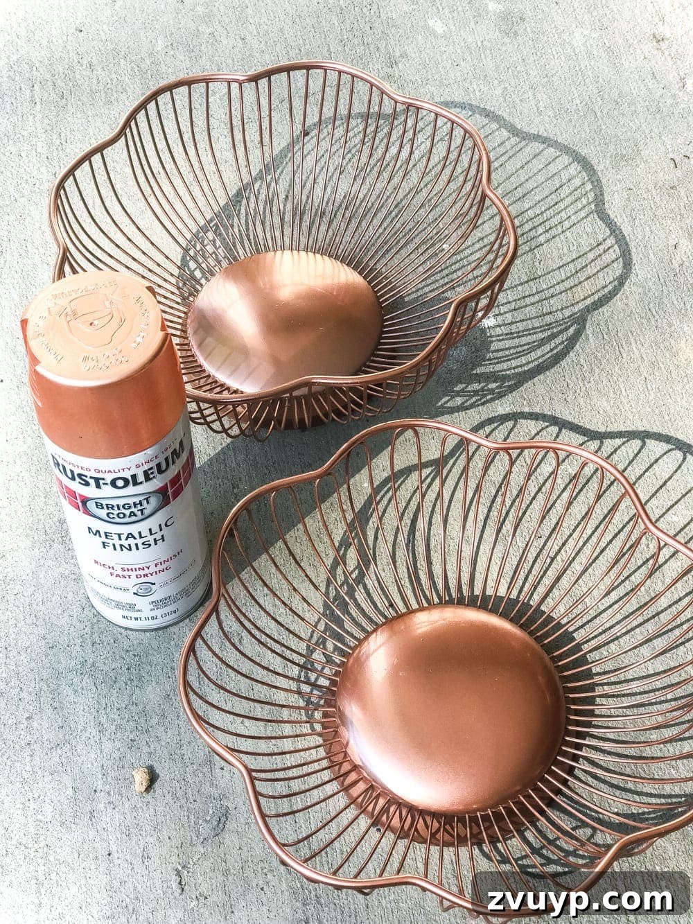 The Unlikely Pumpkin Patch Wire Basket and Bundt Pan Crafts 3 copper spray painted wire bread baskets to make a pumpkin