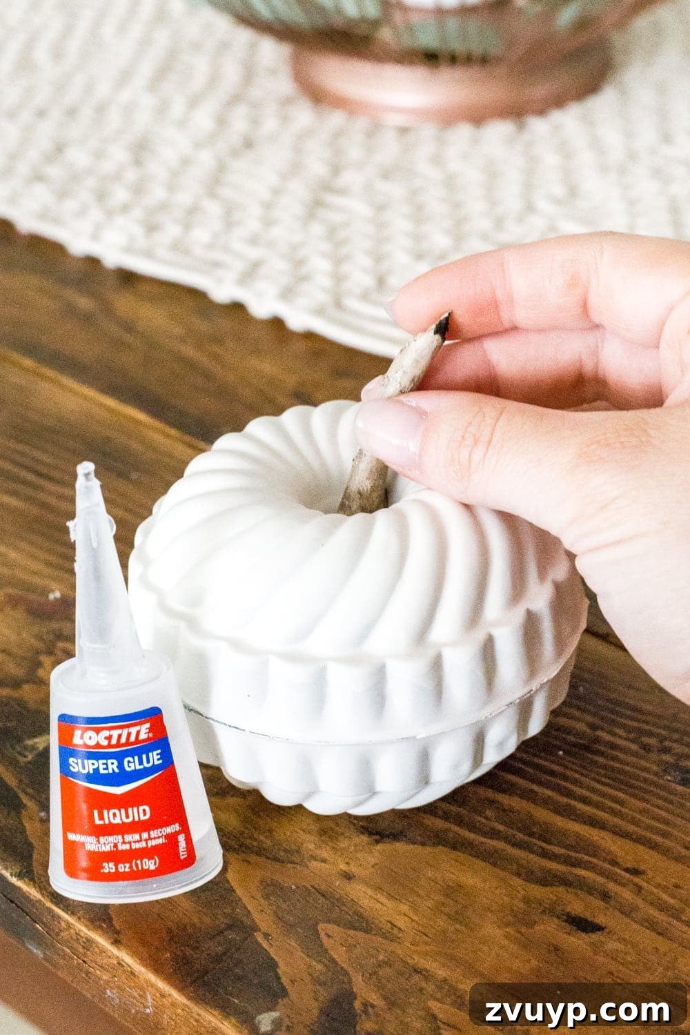 The Unlikely Pumpkin Patch Wire Basket and Bundt Pan Crafts 8 glue two mini bundt pan Jello molds together and stick a twig in the top to make a DIY mini pumpkin