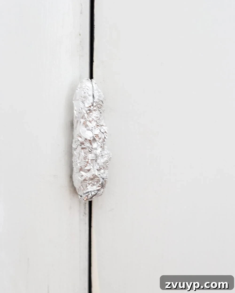 Mastering Door Painting for Unrivaled Durability 15 aluminum foil protecting hinges and doorknob before painting doors