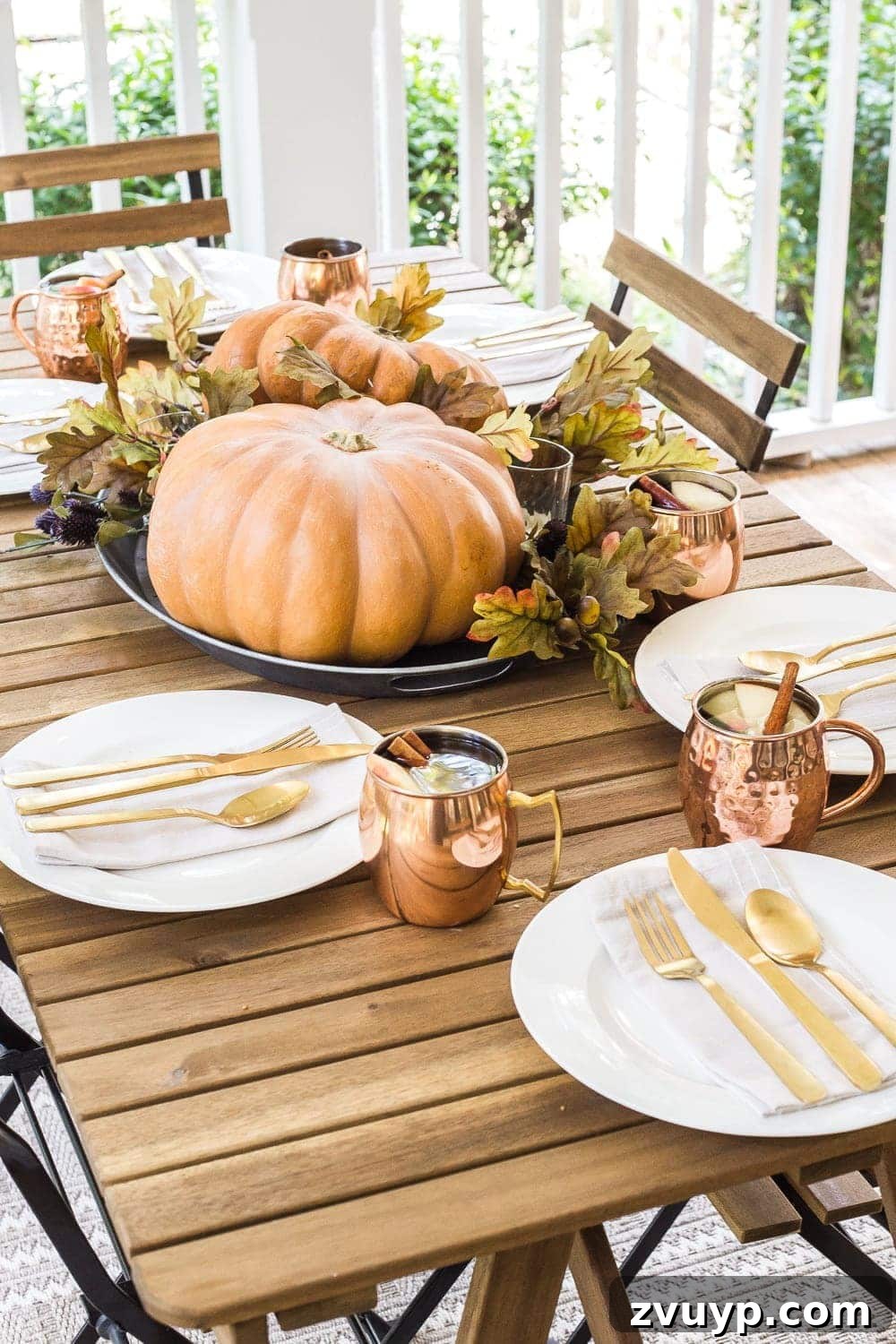 Autumn Porch Retreat: Crafting Cozy Outdoor Style 15 cozy fall porch with copper and pumpkin tablescape