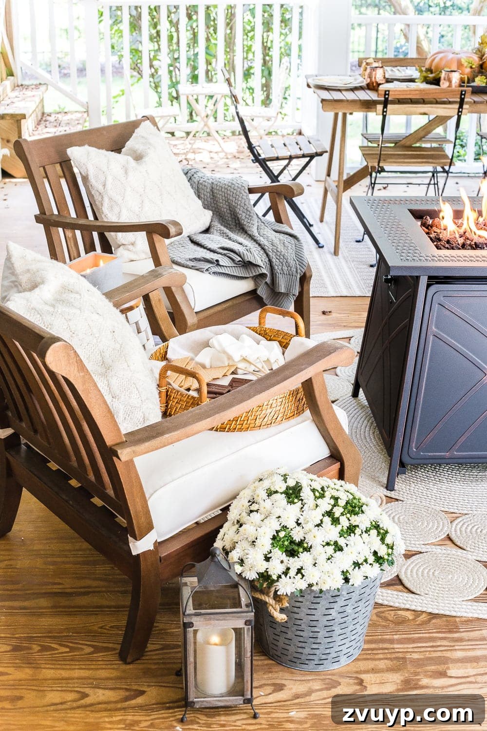 Autumn Porch Retreat: Crafting Cozy Outdoor Style 5 Cozy fall back porch with neutral outdoor furniture and fire pit