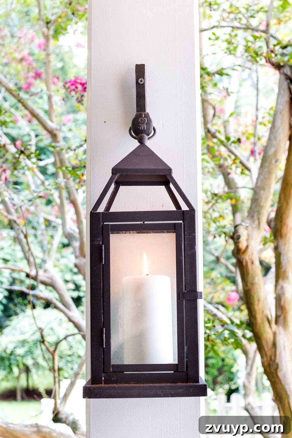 Autumn Porch Retreat: Crafting Cozy Outdoor Style 9 lanterns with railroad spike forged hooks