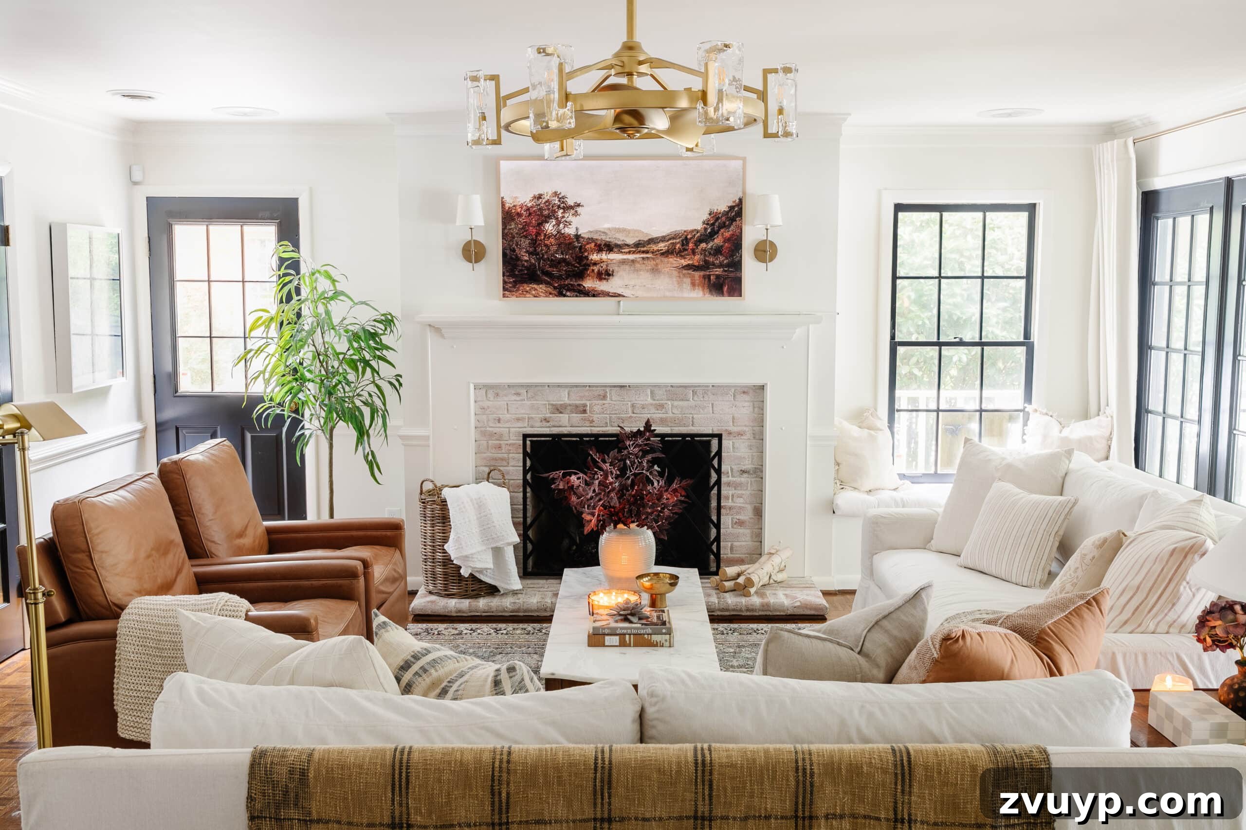 Cozy living room with white sofas and leather recliners, showcasing decor harmony