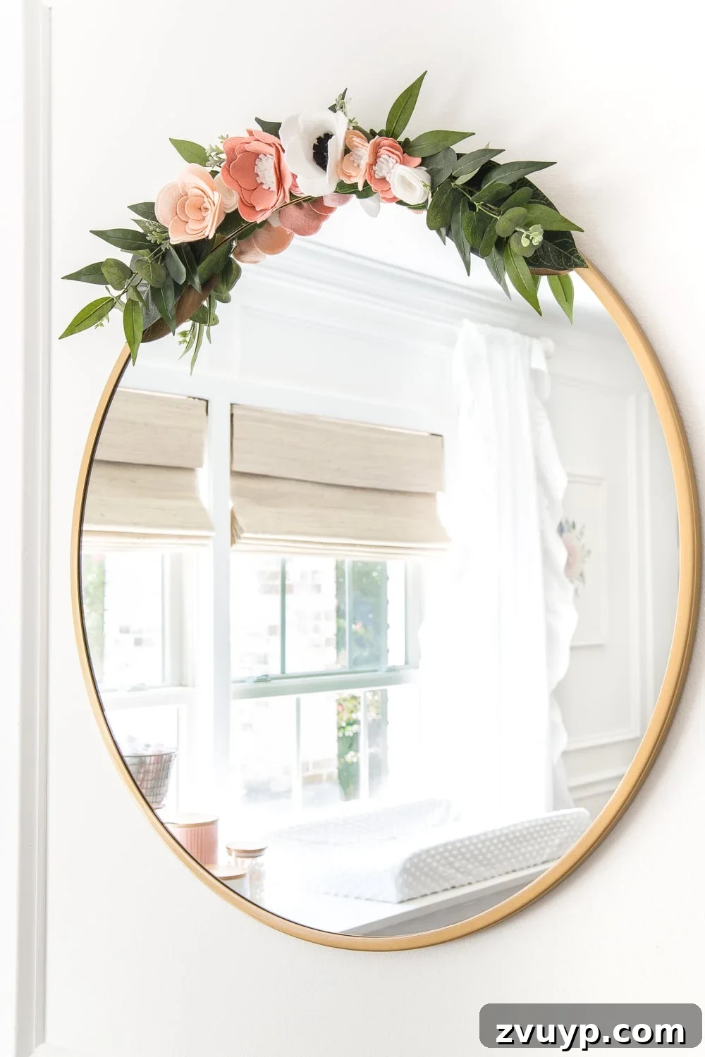 Dreamy White Floral Nursery Transformation 23 An all white nursery makeover room reveal with classic, vintage style furniture, Anthropologie-inspired patterns and textures, and floral accents.