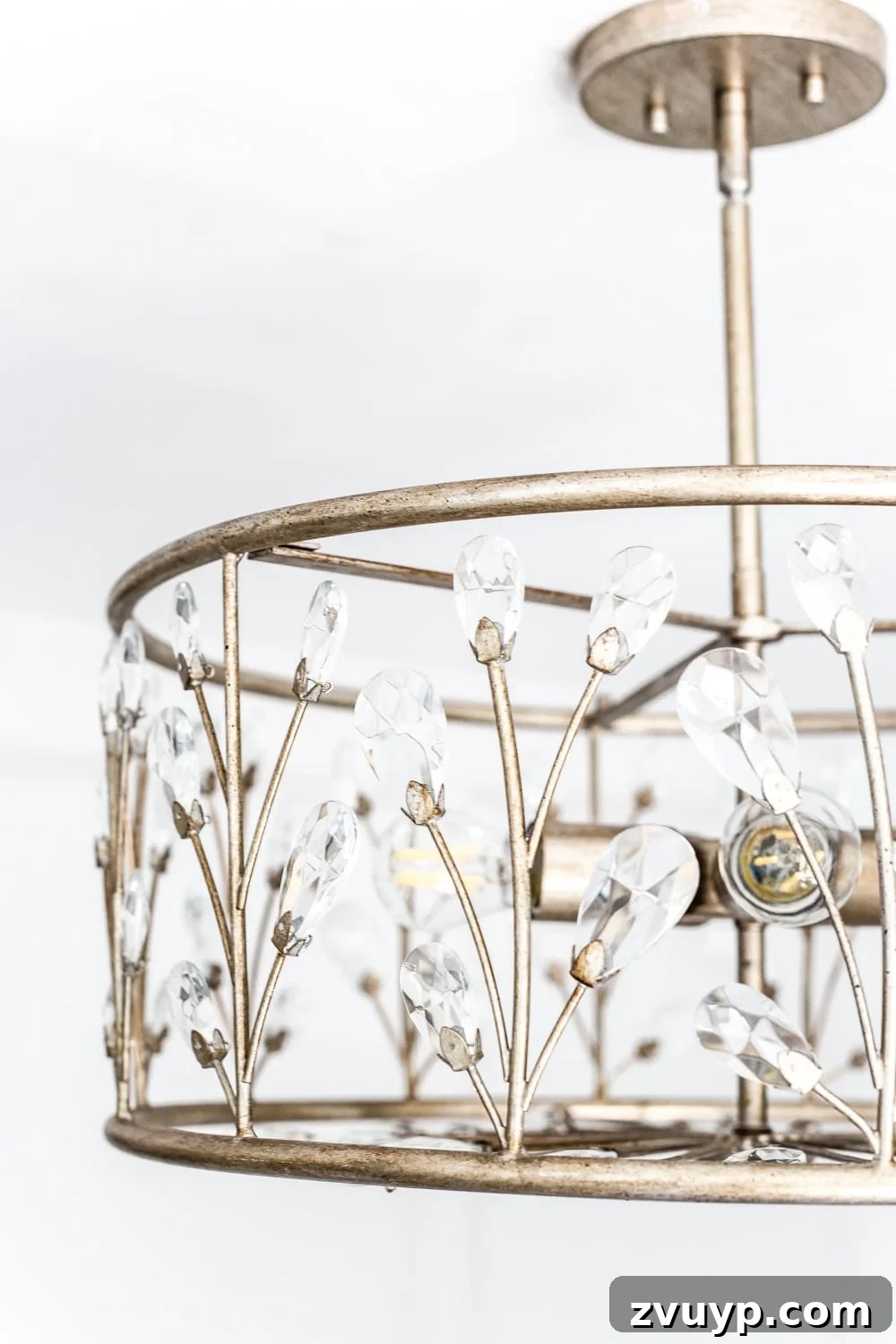 Dreamy White Floral Nursery Transformation 24 An all white nursery makeover room reveal with classic, vintage style furniture, Anthropologie-inspired patterns and textures, and floral accents.