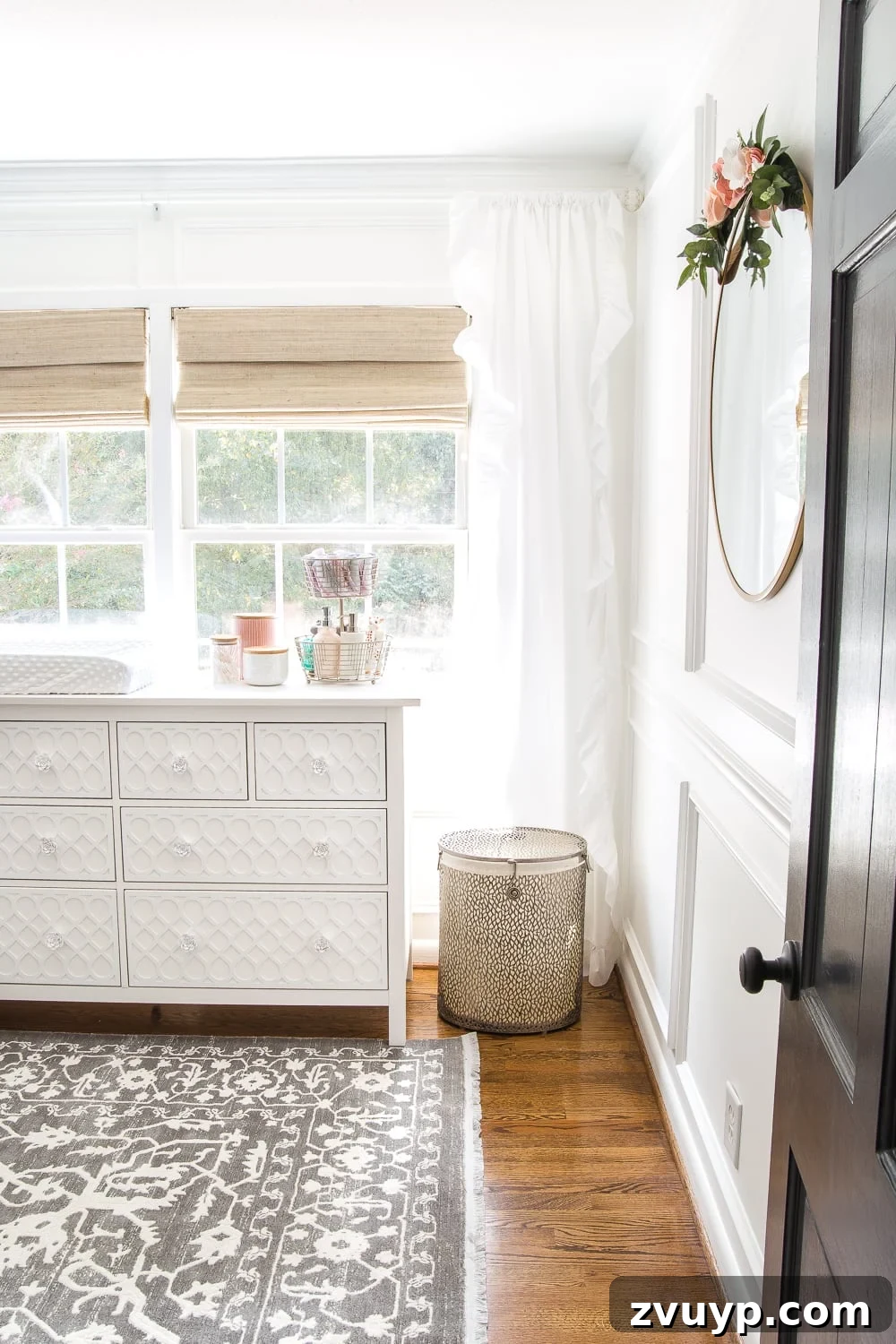 Dreamy White Floral Nursery Transformation 5 An all white nursery makeover room reveal with classic, vintage style furniture, Anthropologie-inspired patterns and textures, and floral accents.