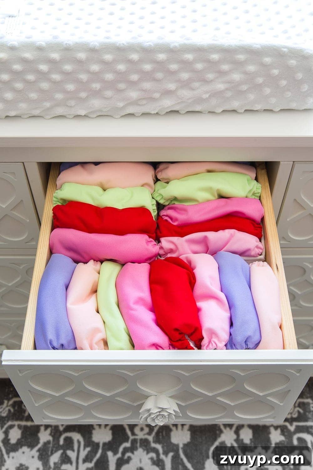 Inside Our Perfectly Organized Nursery 10 Nursery Organization | Dresser drawers with dividers to neatly store cloth diaper covers, making them easy to access