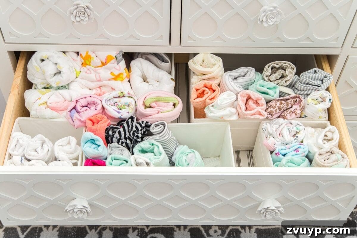 Inside Our Perfectly Organized Nursery 13 Nursery Organization | Dresser drawers with dividers to store baby clothes and swaddles in categories by size