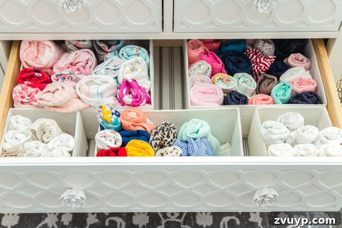 Inside Our Perfectly Organized Nursery 14 Nursery Organization | Dresser drawers with dividers for baby clothes categorized by size