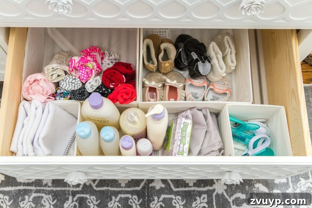 Inside Our Perfectly Organized Nursery 16 Nursery Organization | Dresser drawers with dividers to store baby bath soap, grooming kit, changing pads, shoes, and diaper pail bags