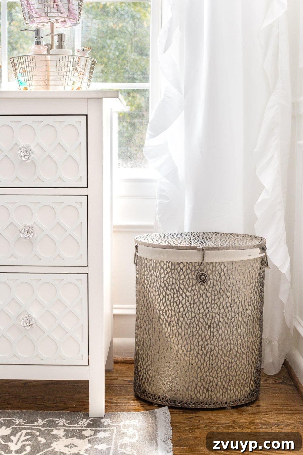 Inside Our Perfectly Organized Nursery 3 Nursery Organization | Use a lidded hamper with a liner for easy washing and to contain baby smells, ideal for dirty clothes