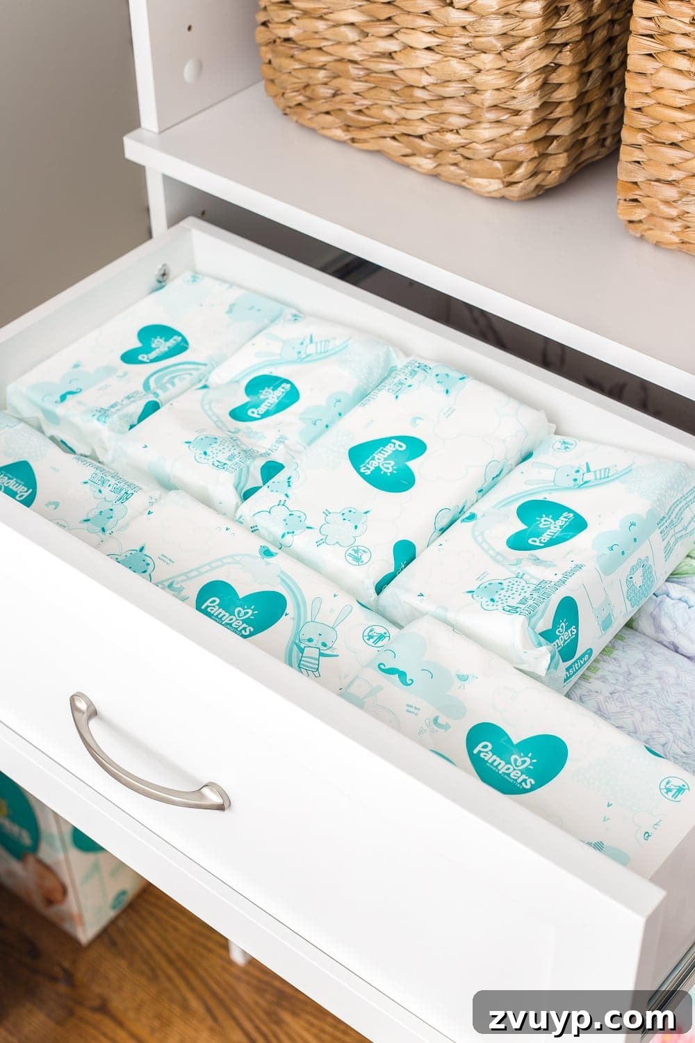 Inside Our Perfectly Organized Nursery 20 Nursery Organization | Closet drawers with extra disposable wipes and diapers for backup