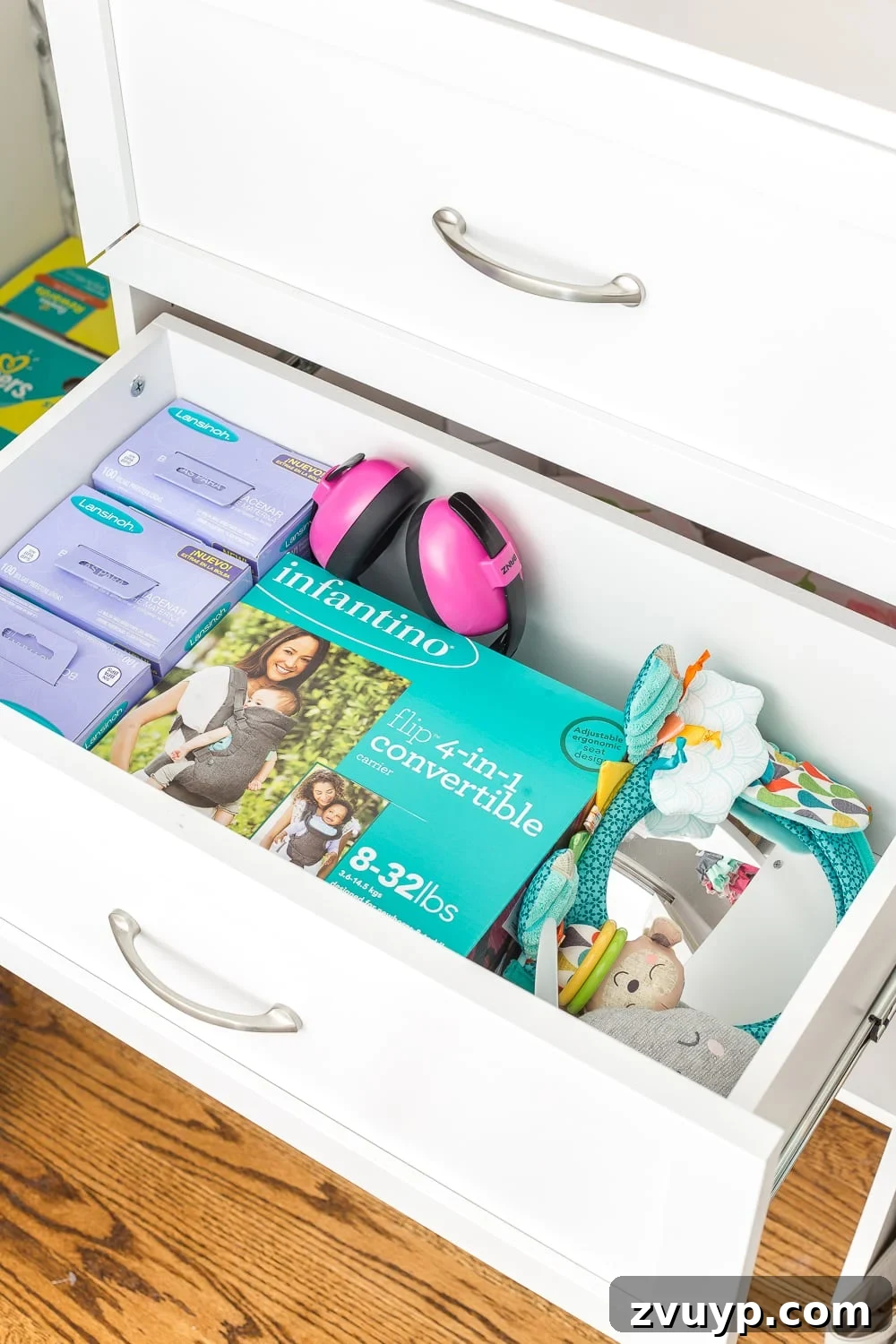 Organized Nursery Closet Makeover Plus Free Printable Dividers 13 Nursery closet organization with shelving and built-in drawers for baby essentials