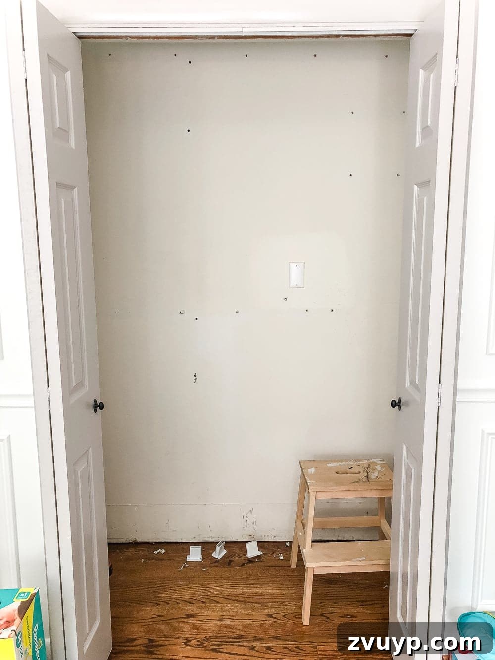 Organized Nursery Closet Makeover Plus Free Printable Dividers 5 Nursery closet with wire shelving removed