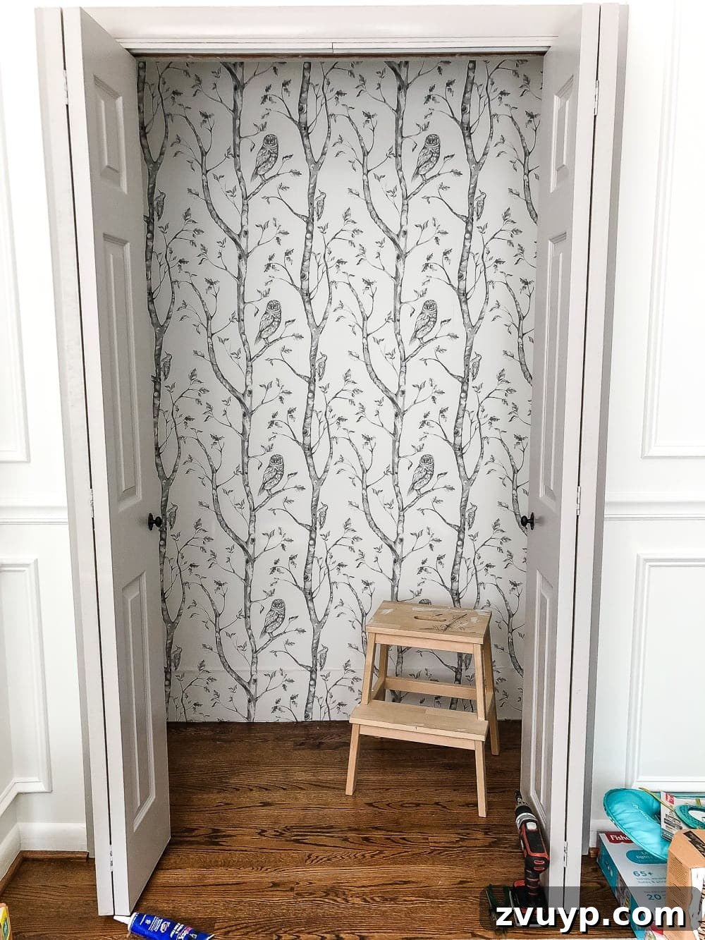 Organized Nursery Closet Makeover Plus Free Printable Dividers 6 Nursery closet with peel and stick gray birch tree wallpaper