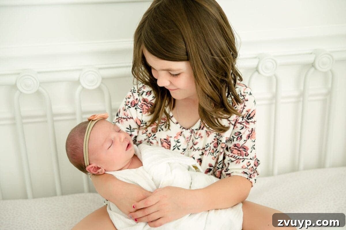 Regans Birth The Day We Became Four 18 A tender shot of mother and newborn Regan, looking at each other with love