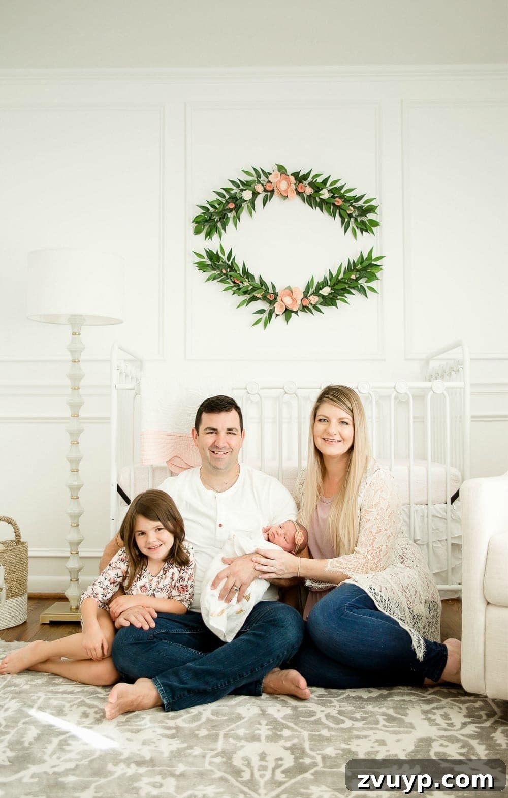 Regans Birth The Day We Became Four 5 Newborn Regan wrapped comfortably, eyes closed, appearing peaceful