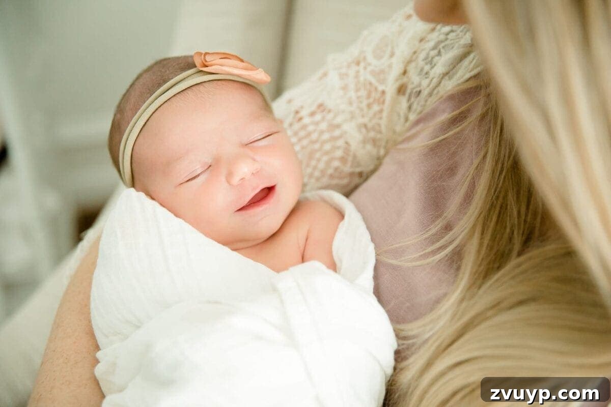 Regans Birth The Day We Became Four 8 Newborn baby Regan's tiny hands resting gently on her chest