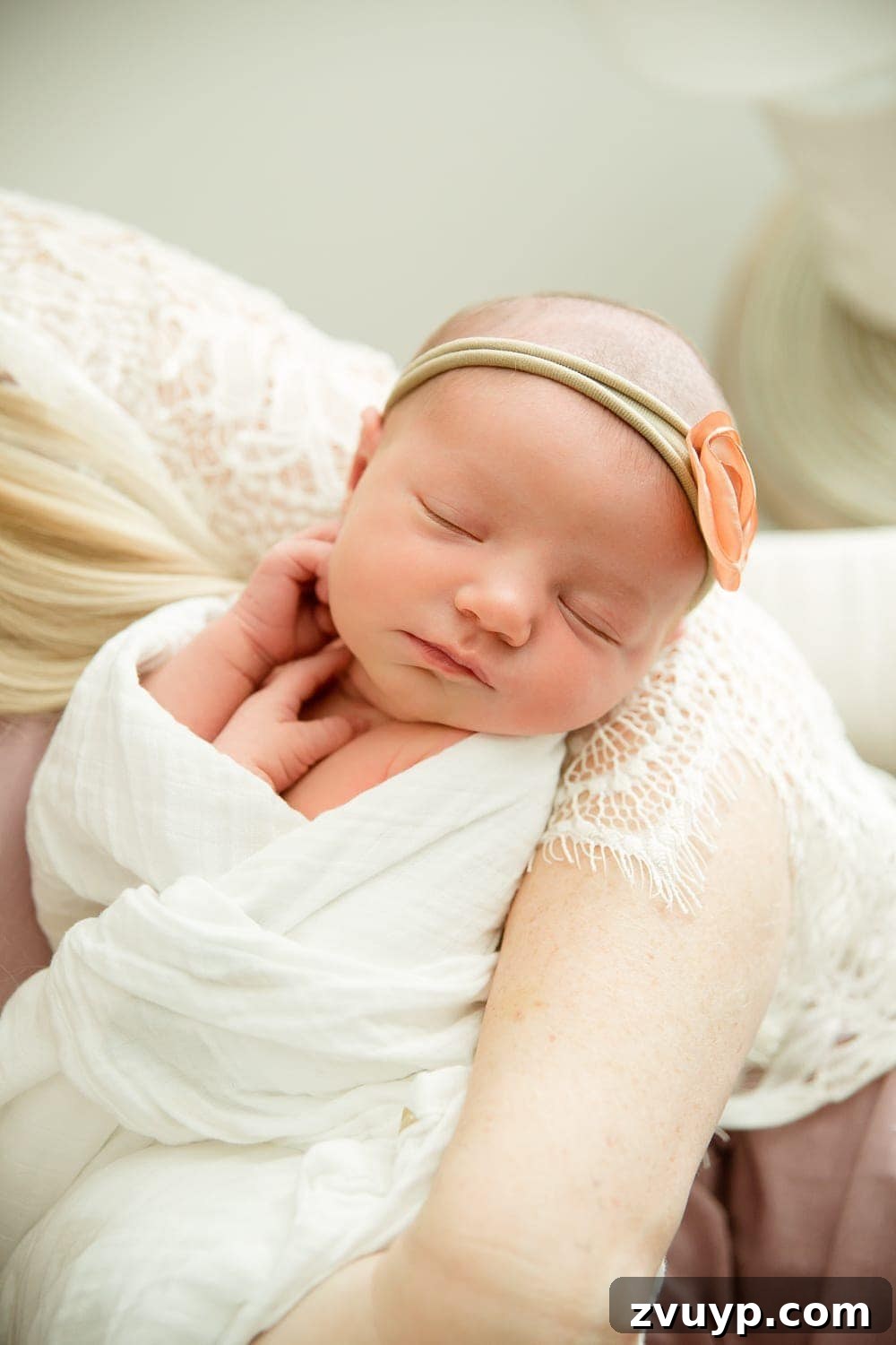 Regans Birth The Day We Became Four 9 A tender close-up of newborn Regan's face, highlighting her innocence