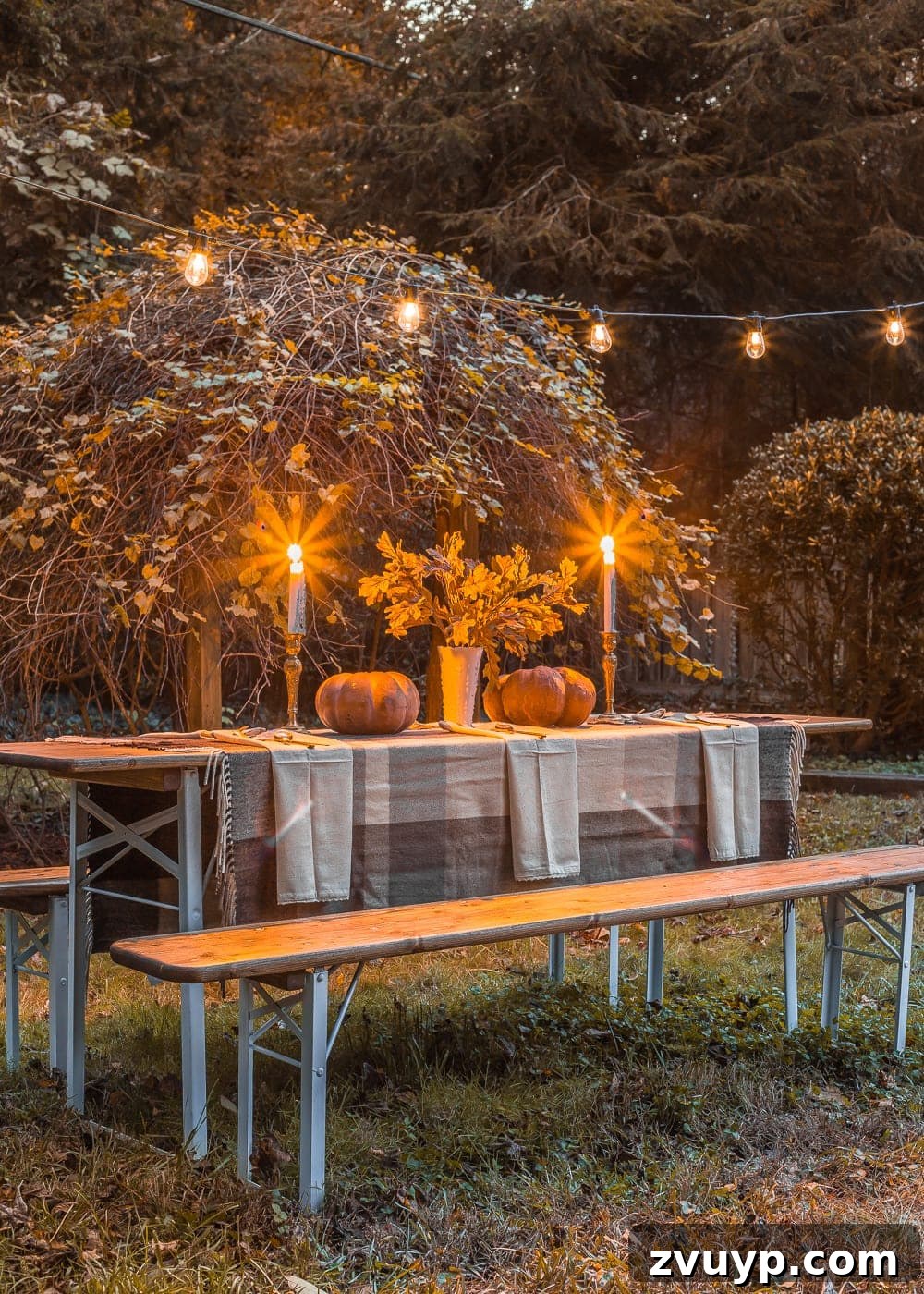 The newly refinished antique beer garden table set with alfresco Thanksgiving decor, viewed from above