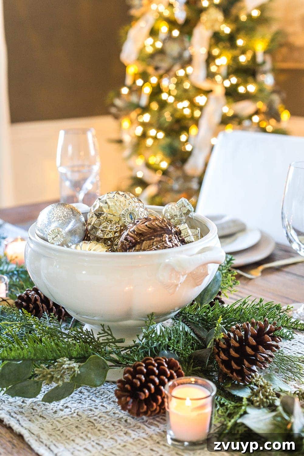 Festive Home Tours 2018 11 Detail of a dining room place setting with a green ribbon napkin tie, adding a special touch to the holiday table.