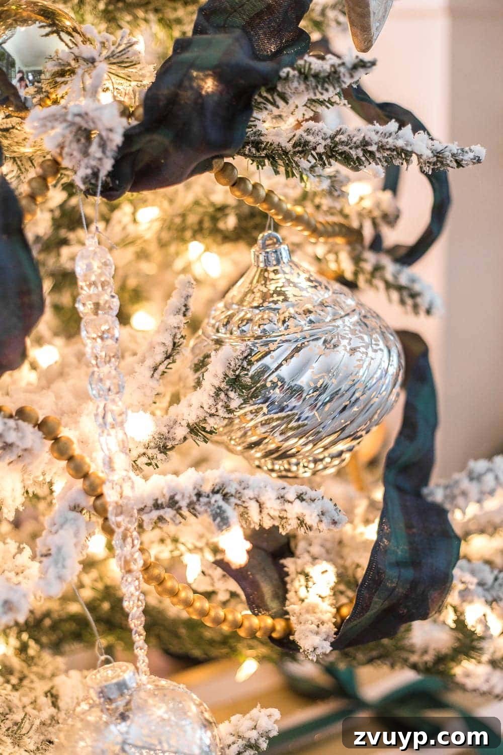 Festive Home Tours 2018 27 Close-up of a beautifully decorated Christmas tree with a mixture of traditional and DIY ornaments, showcasing intricate details.