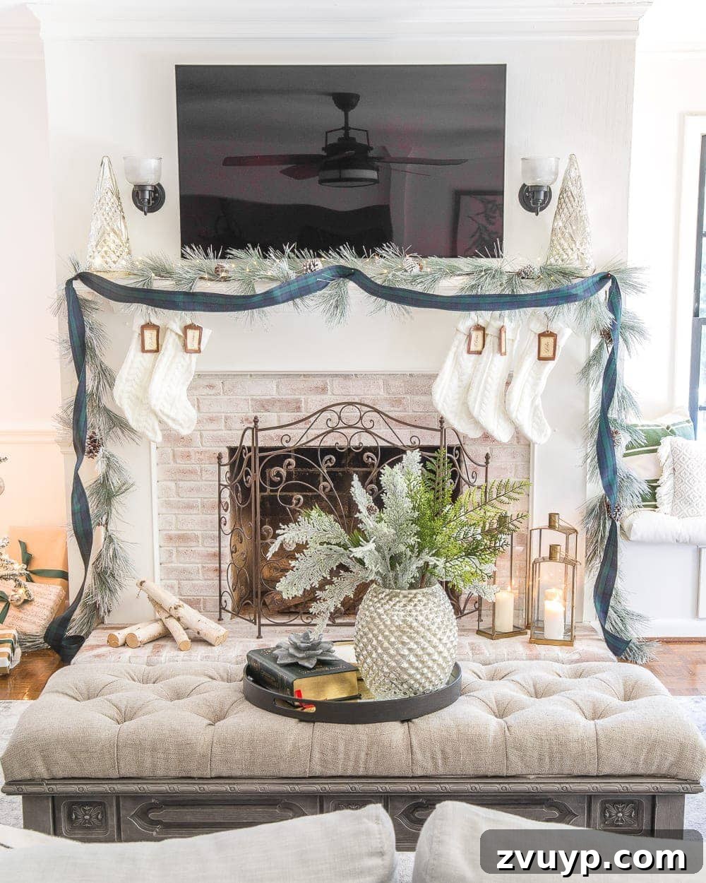 Festive Home Tours 2018 30 Detailed shot of the Christmas tree with Black Watch Tartan ribbon cascading through the branches, creating a rich and classic look.