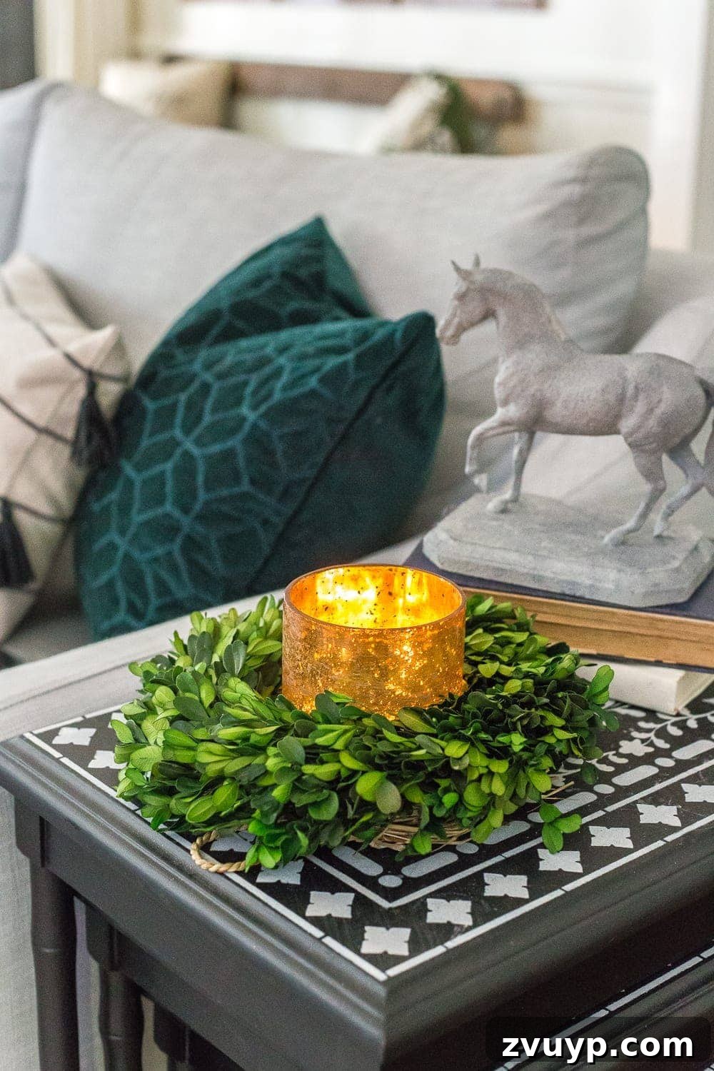 Festive Home Tours 2018 34 Living room decorated for Christmas with a beautifully adorned mantel, garland, and personalized stockings, creating a festive focal point.