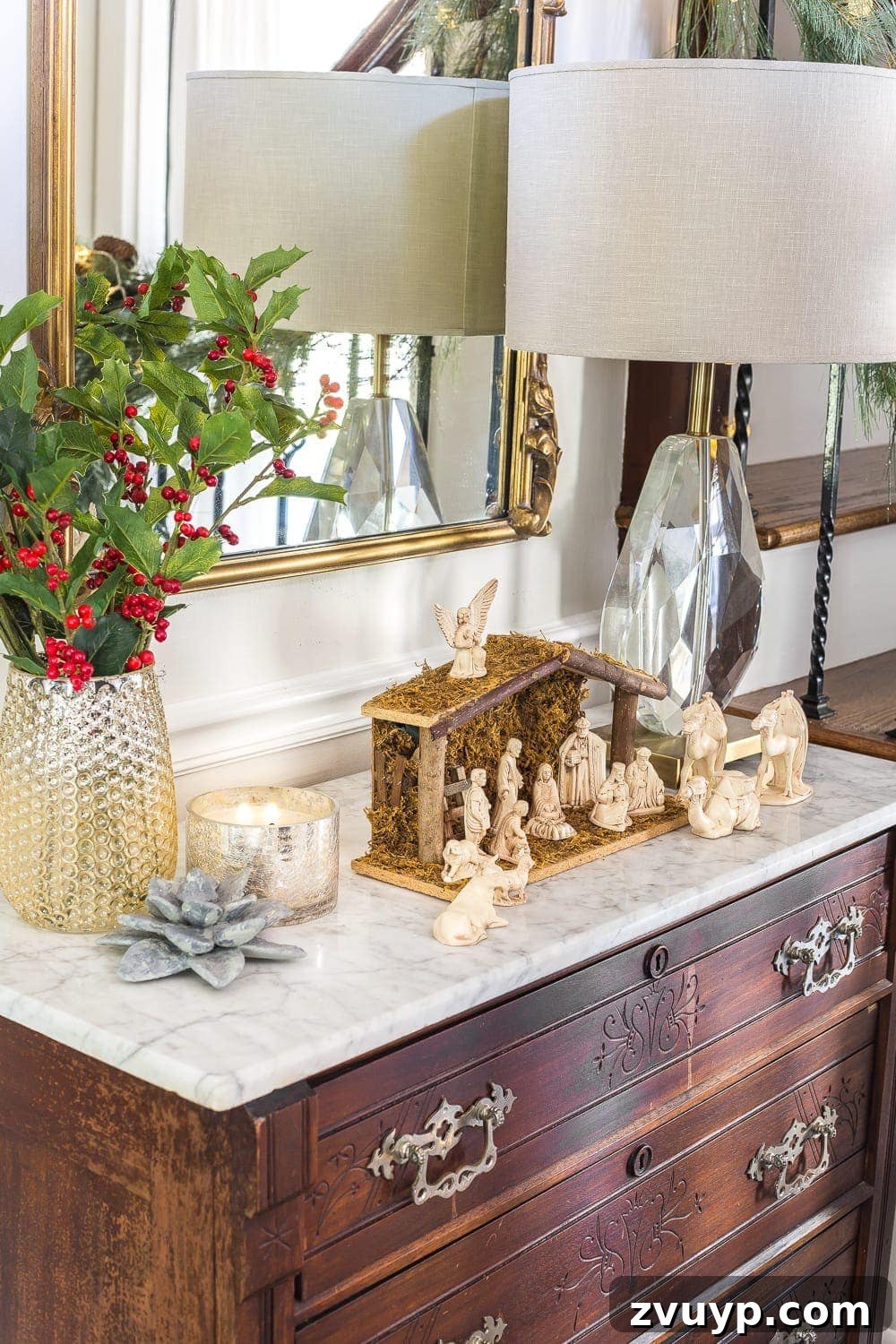 Festive Home Tours 2018 5 Detailed shot of the nativity scene atop the Eastlake chest, surrounded by warm holiday decor.