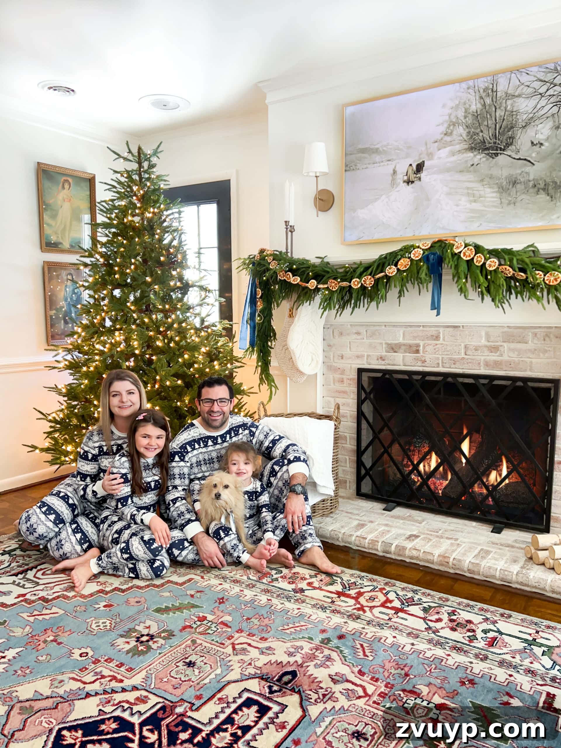 Cozy Christmas Captures: Easy DIY Family Photos at Home 3 DIY Christmas family photoshoot with children in festive pajamas in front of a beautifully decorated Christmas tree