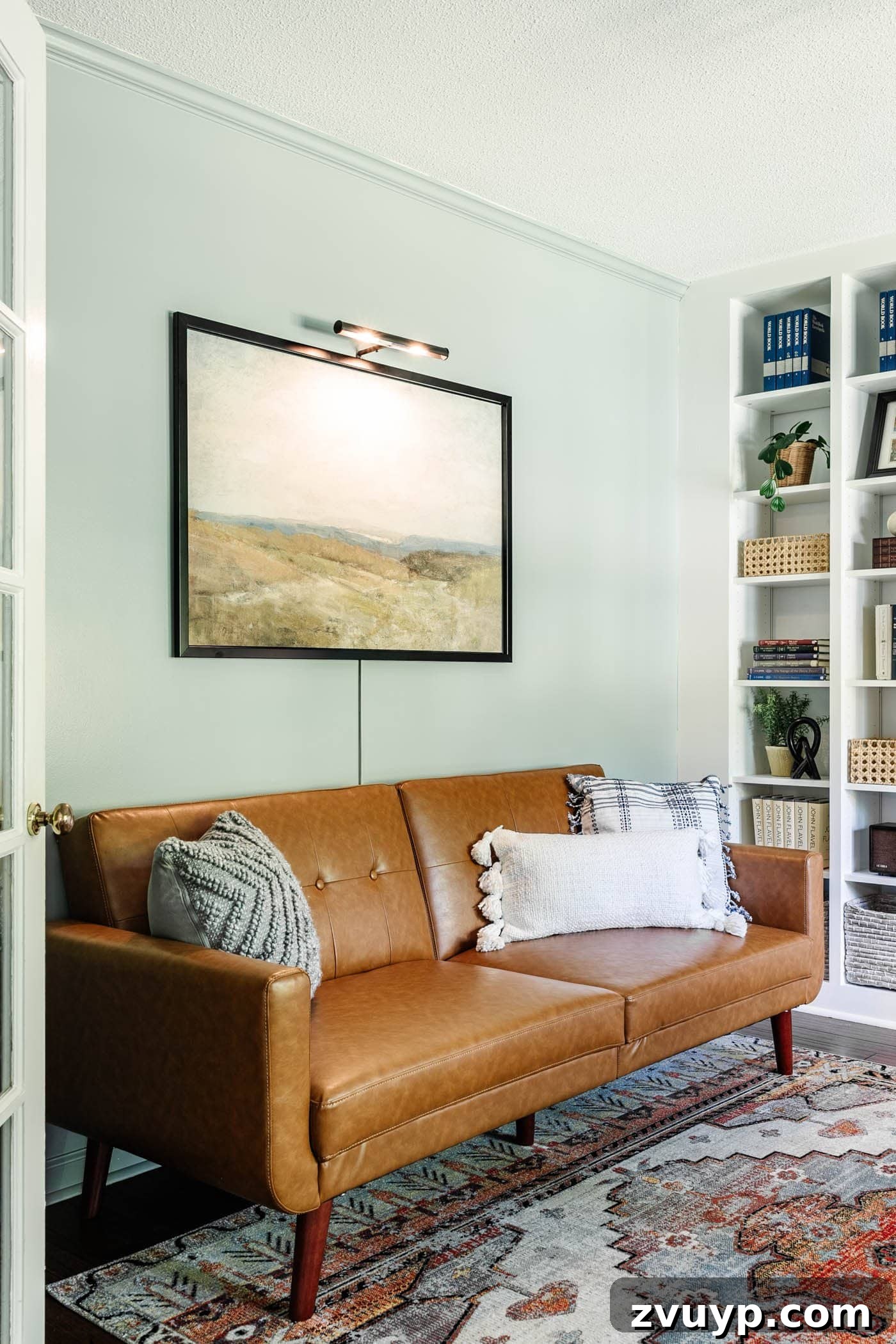 Clever Ways to Camouflage Household Eyesores 7 office art above sofa with picture light