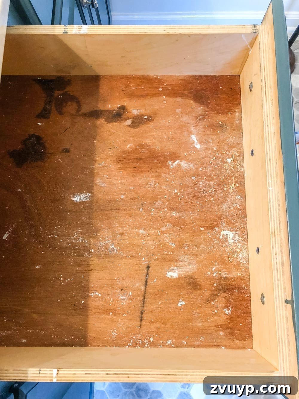 From Mess to Marvel: 6 Steps to a Perfect Bathroom Vanity 5 Sorting Bathroom Items During Organization - Various bathroom products laid out on a counter, grouped into categories for sorting.