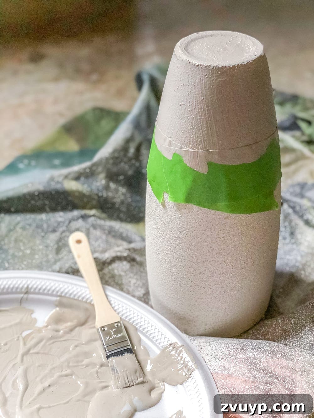 Thrift Store Vase Gets a Stoneware Makeover 6 Taping off vase for dipped craft paint effect
