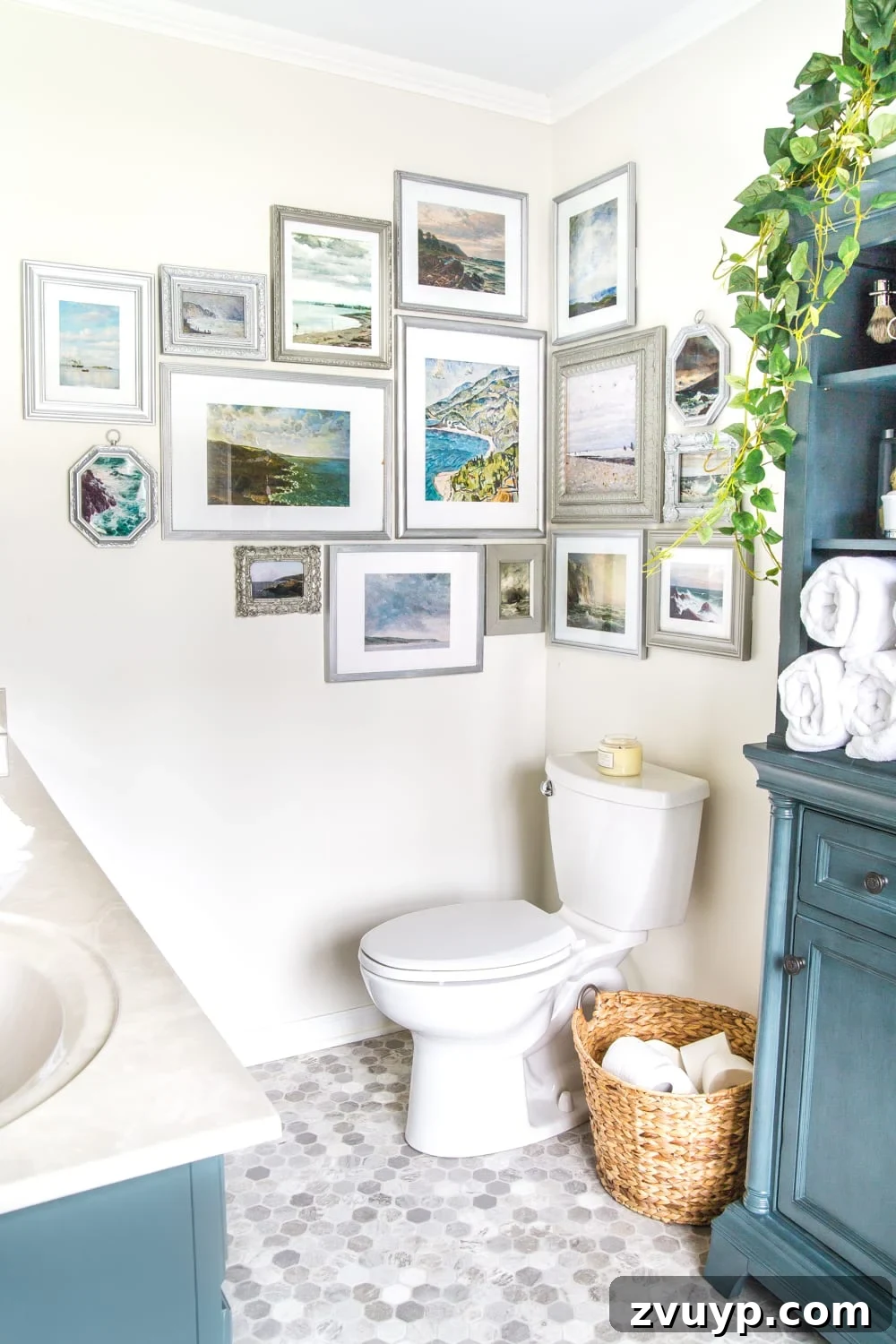 Coastal Charm Printable Art Gallery 2 Coastal gallery wall featuring free printable antique ocean paintings framed in thrifted finds, perfect for budget-friendly bathroom decor. #coastaldecor #gallerywall #bathroomart #bathroomwall #bathroomdecor #coastalart