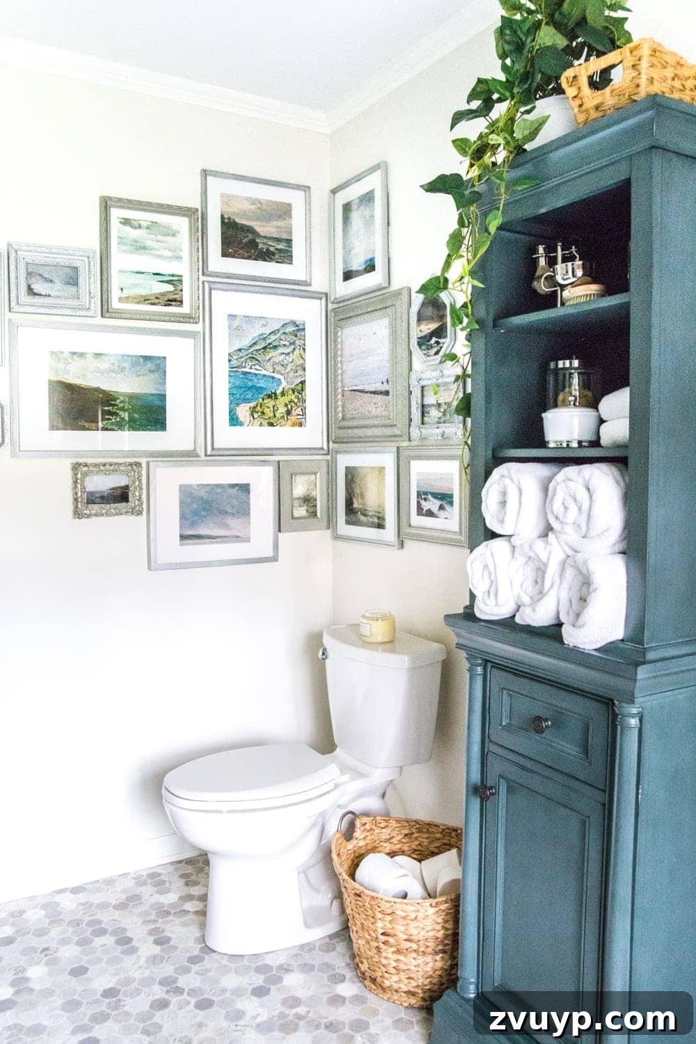 Coastal Charm Printable Art Gallery 12 Full view of the finished DIY coastal gallery wall with free printable antique ocean art. #coastaldecor #gallerywall #bathroomart #bathroommakeover
