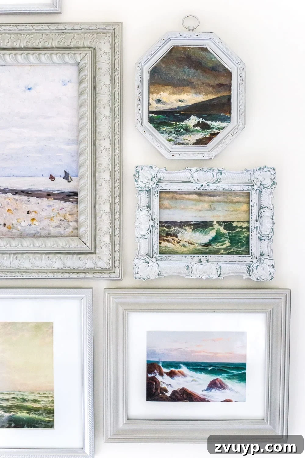 Coastal Charm Printable Art Gallery 3 Budget-friendly coastal gallery wall with antique ocean prints and refurbished thrift store frames for bathroom art. #coastaldecor #gallerywall #bathroomart #bathroomwall #bathroomdecor #coastalart
