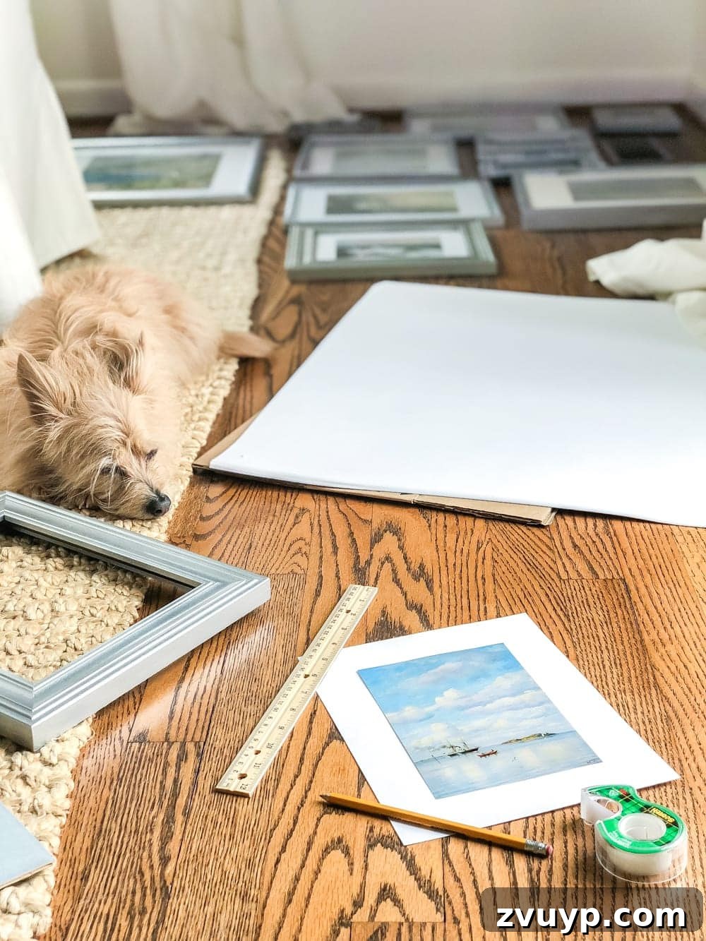 Coastal Charm Printable Art Gallery 9 Lola, the helper, assisting with a DIY coastal gallery wall project. #petfriendlyDIY #homeprojects #craftingwithpets